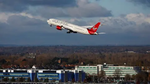 Reuters A Virgin Atlantic aircraft takes off from Heathrow in November 2023, the first 100% Sustainable Aviation Fuel transatlantic flight.