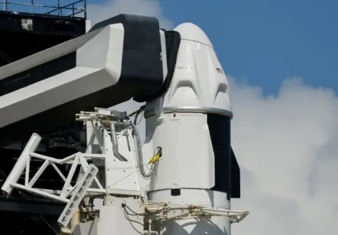 Reuters Dragon Spacecraft on top of Falcon 9 Rocket