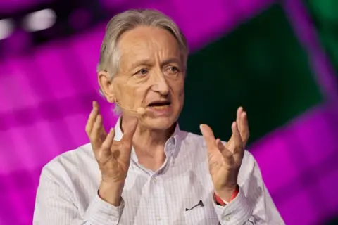 Getty Images British-Canadian cognitive psychologist and computer scientist Geoffrey Hinton, known as the 'godfather of AI' speaks with Nick Thompson of The Atlantic (off frame) during the Collision Tech Conference at the Enercare Centre in Toronto, Ontario, Canada, on June 28, 2023. 