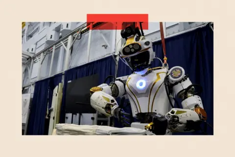 Reuters NASA's humanoid robot Valkyrie opening a bag 